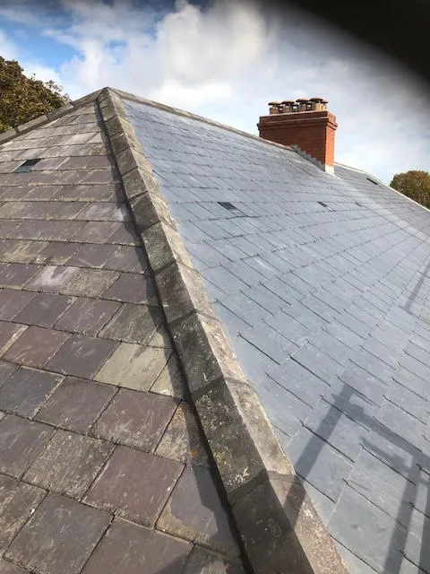 Roof being replaced. Existing Bangor slates on the front and side slopes. New Spanish slates on the back — photo 21