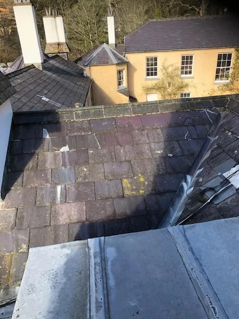 An old lead flat roof and it being replaced — photo 1