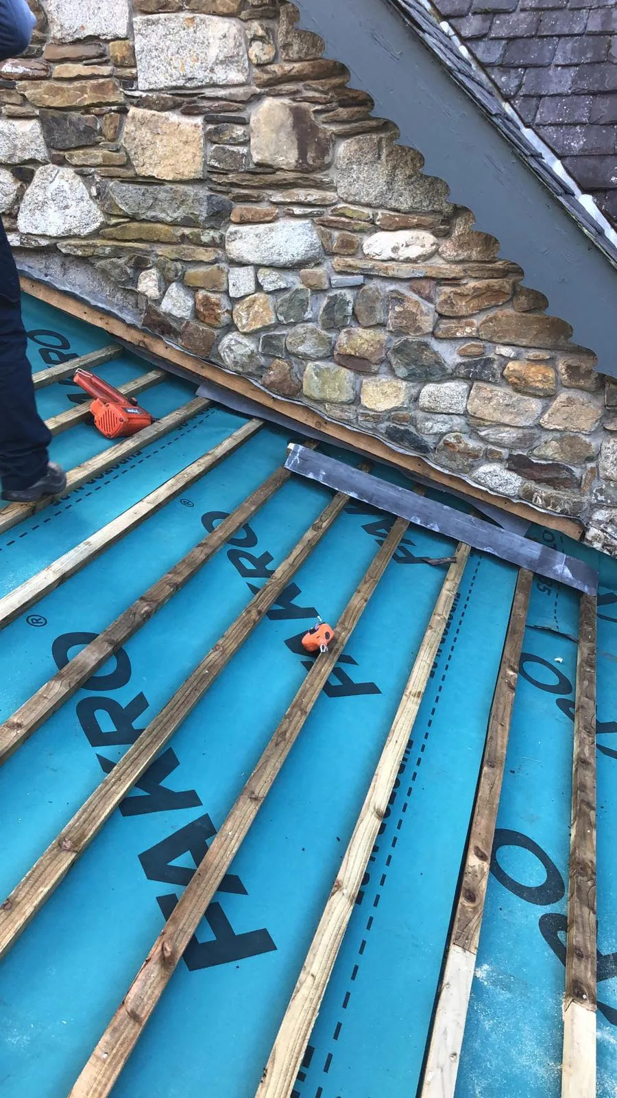 Badly leaking roof being replaced — photo 5