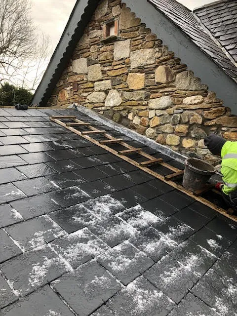 Badly leaking roof being replaced — photo 7